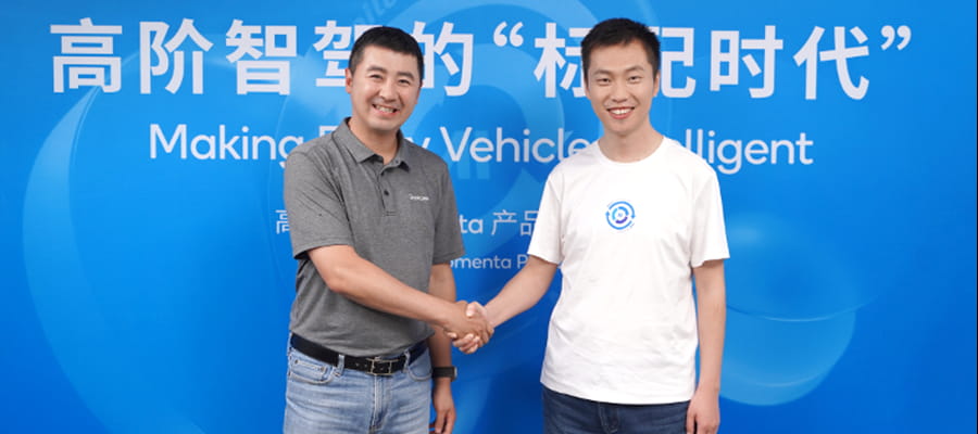 高通技术公司销售及业务拓展副总裁羡磊与Momenta CEO曹旭东